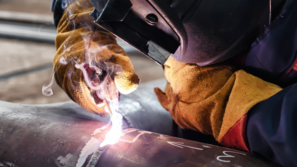 Welder working with protective gear to Protect Yourself Against Arc Flash