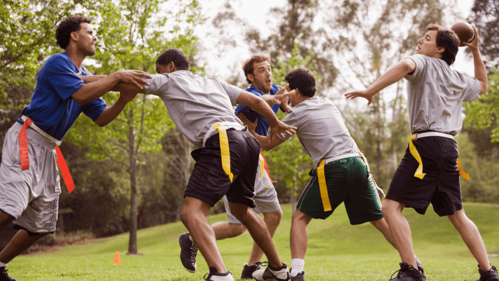 Ares Sportswear Custom Football Team Shorts with team playing flag football